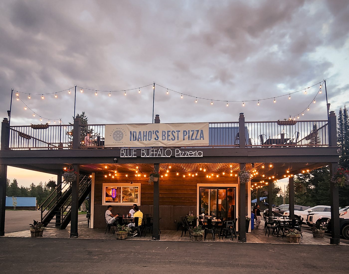 Blue Buffalo Pizzeria storefront at dusk — Idaho's Best Pizza in Island Park