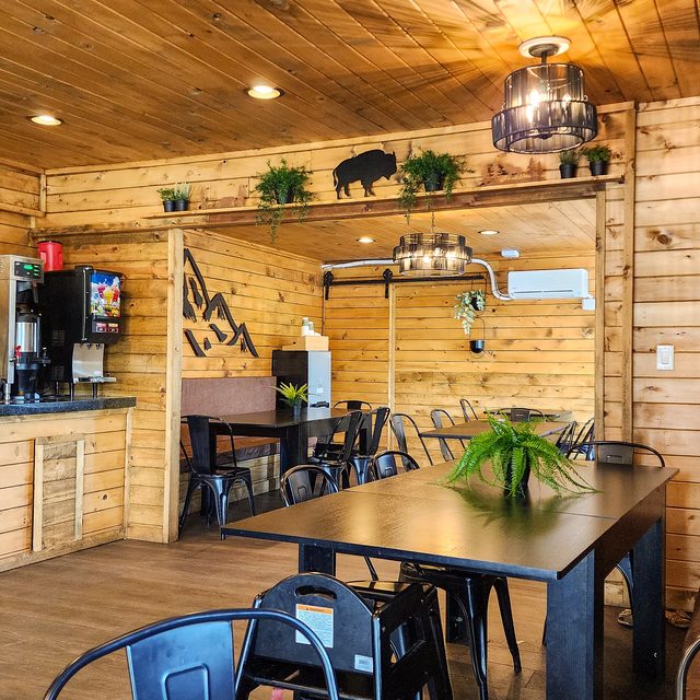 Cozy wood-lodge dining room at Blue Buffalo Pizzeria