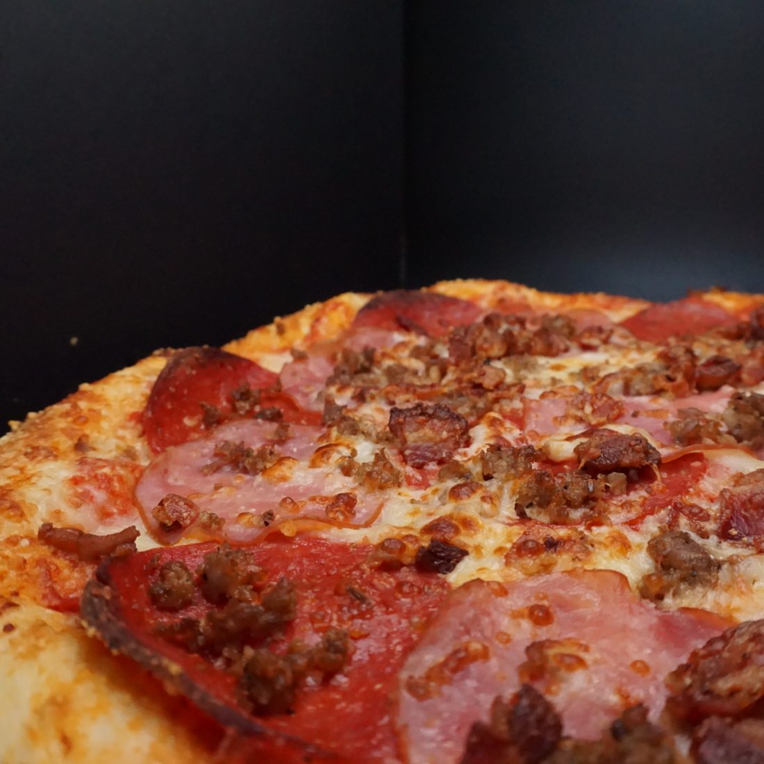 Meat Eater pizza with pepperoni, bacon, sausage and Canadian bacon